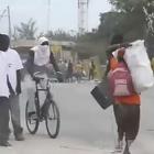 Looters Running In Haiti Following Earthquake