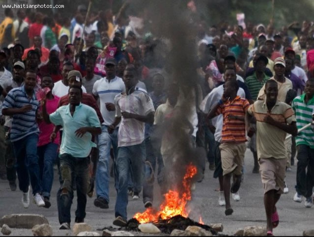 Protest And Tire Burning By Haitians