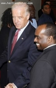 Vice-President Joe Biden And Haitian Priest Rev. Reginald Jean Mary