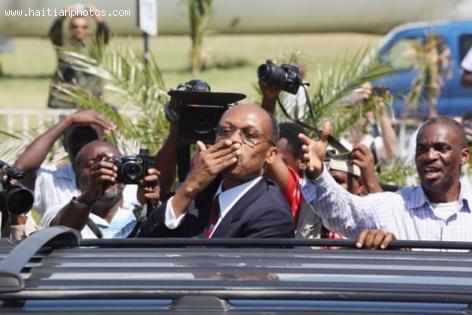 Jean Bertrand Aristide Blowing Kisses to supporters