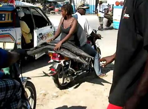 Moto Taxi Transporting Fish in Haiti