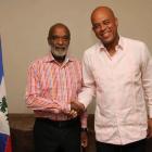 Rene Preval in Pink with Michel Martelly, has he converted into Tet Kale?