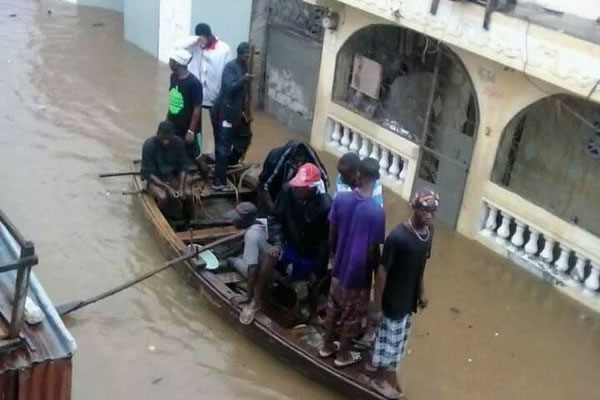 Boat in the street of Cap-Haitian due to flood