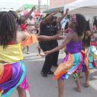 Miami Police Officer dancing Rara Lakay in Little Haiti