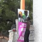 Spray painting of Martelly and Lamothe Picture during Protest