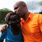 Prime Minister Laurent Lamothe with an elderly Haitian Woman