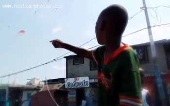 Child In Haiti Playing Withe Kite
