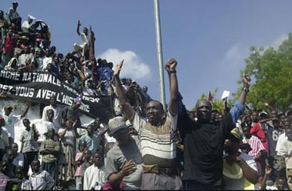 Himmler Rebu, Evans Paul in Anti-Aristide march, Cap-Haitian