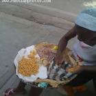 Street Vandor Selling Grilled Peanut - Haitian Food