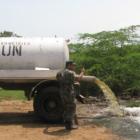 Picture Of A Tanker Truck Dumping Excrements Near Mirebalais Base